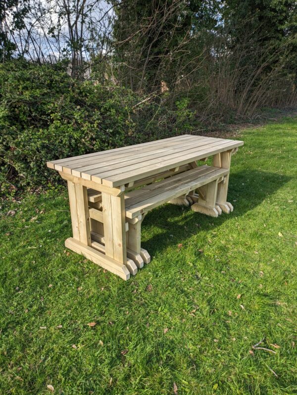 Light green 6ft picnic table set with straight edges, benches neatly stored underneath.